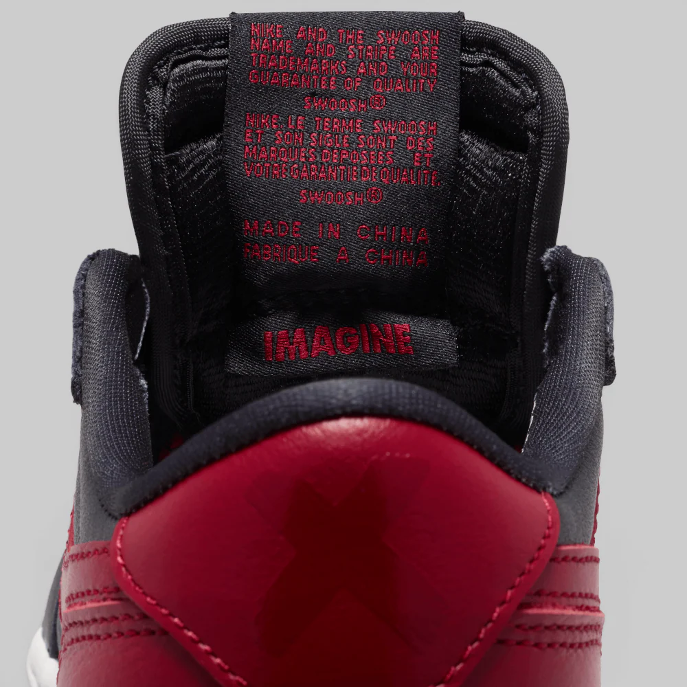 Air Jordan 1 Retro Low OG (Grade School) "Banned" - Image 7