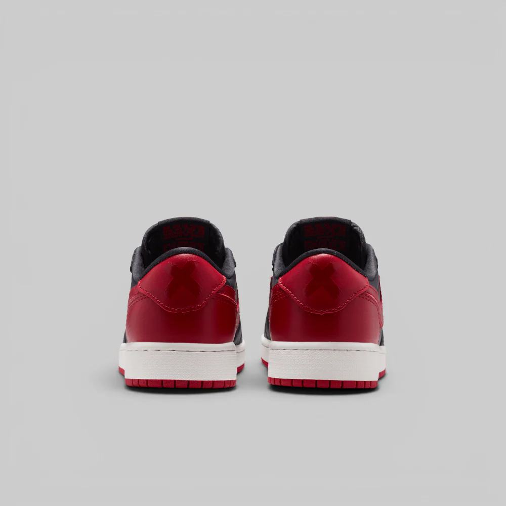 Air Jordan 1 Retro Low OG (Grade School) "Banned" - Image 9